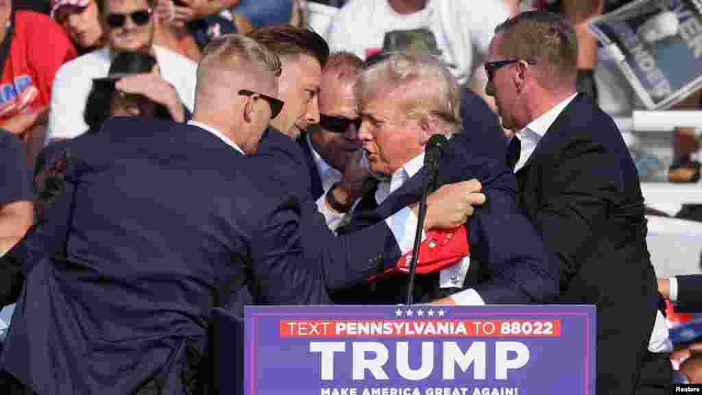 Стрельба произошла 14 июля во время выступления Трампа перед сторонниками под открытым небом. В сторону Дональда Трампа выстрелили около десяти раз. Вторым выстрелом стрелок ранил Трампа