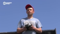 Харьковский фермер пашет "минные поля" на радиоуправляемом бронированном тракторе Харьковский фермер пашет "минные поля" на радиоуправляемом бронированном тракторе