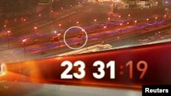 Кадр с камеры наблюдения, зафиксировавшей убийство Немцова