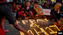 Малайзийцы скорбят по погибшим пассажирам рейса MH-17