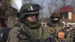 "Взятых в плен в Донецком аэропорту избивали железными прутами" "Взятых в плен в Донецком аэропорту избивали железными прутами"