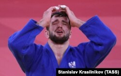 Шамиль Борчашвили (Австрия) после победы в поединке за 3-е место против Доминика Ресселя (Германия). Фото ТАСС, 27 июля 2021 года