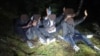 Lithuania -- Migrants detained crossing into Lithuania from Belarus