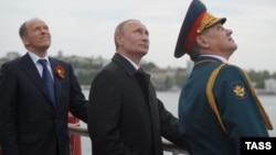 Глава ФСБ РФ Александр Бортников, президент РФ Владимир Путин и глава Минобороны РФ Сергей Шойгу