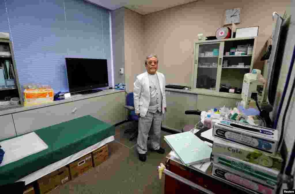 "Зона отчуждения" вокруг разрушенной станции составляет 20 километров. На фото – Южди Кимура, единственный врач в единственной больнице в Намиэ